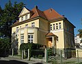 Villa mit Einfriedung