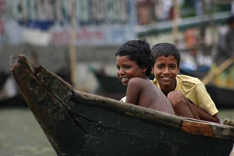 File:Bangladeshi children smile in canoe, Dhaka.jpg