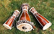 Three types of bata drums (from left: Okonkolo, Iya, Itotele). Bata drums.jpg