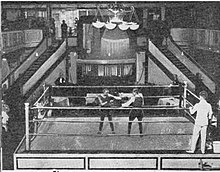 A boxing match in the Holborn Stadium c1905 Boxing Match Stadium Club 1910.jpg
