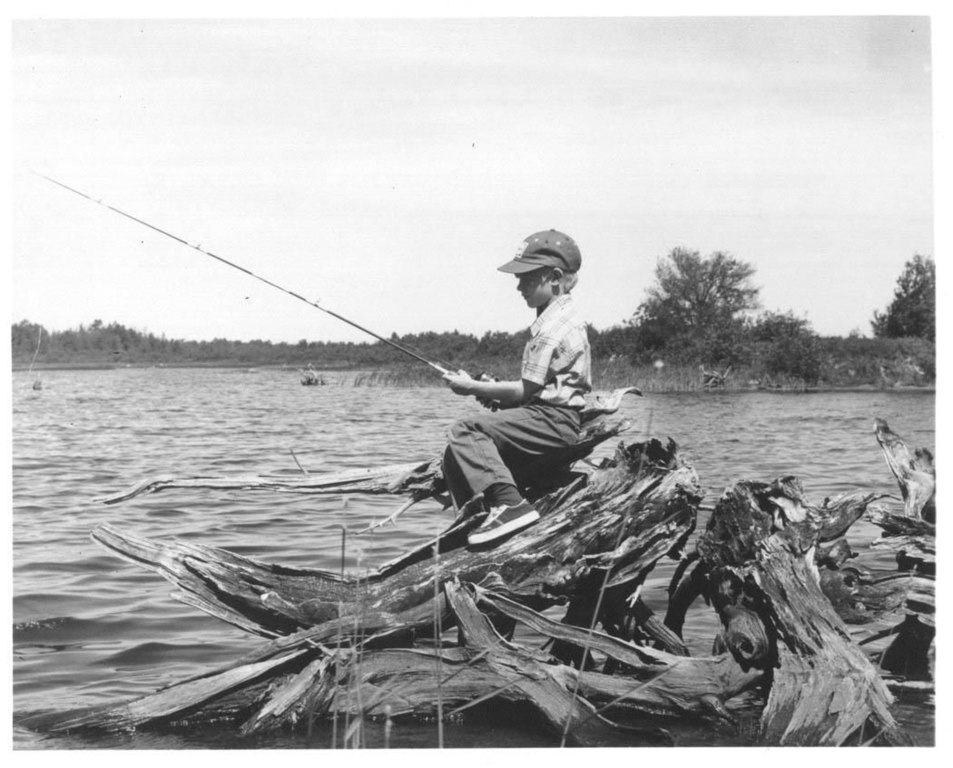 Vintage boy and father fishing hi-res stock photography and images