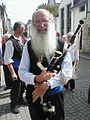 Breton pipe player