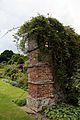 Brick pier with climbing rose in Walled Garden of Goodnestone Park Kent England - moderate sun.jpg