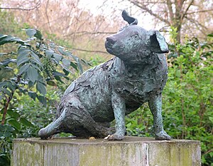 Photograph of a dog statue in metal