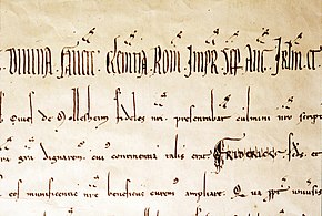 Text medieval latin scris cu litere gotice.  Pe a doua linie apare numele „Mollesheim”.