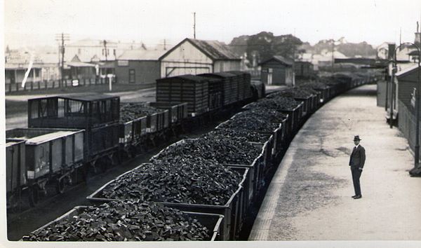 Coal train passing through Moe Station, ~1920