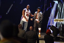 Cryme Tyme in 2008 during Raw, looking at Mr. McMahon's million dollars CrymeTymeJune2nd2008-RabobankBakersfield.jpg