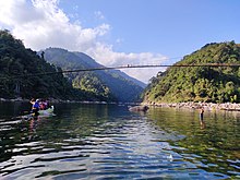 Dawki Bridge over the Umngot Dawki Bridge and Umngot River.jpg