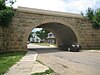 Illinois Central Stone Arch Railroad Bridges, bridge over First Street