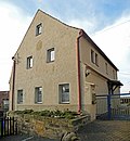 Residential house in open development, former school