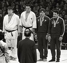 Doug Rogers, Isao Inokuma, Parnaoz Čikviladze a Anzor Kiknadze na LOH 1964