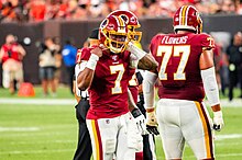 Quarterback Dwayne Haskins (#7) was drafted in the first round of the 2019 NFL Draft but released the following year after inconsistent play and off-the-field issues. Dwayne haskins ereck flowers 2019.jpg