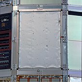 PTFE thermal cover showing impact craters, from NASA's Ultra Heavy Cosmic Ray Experiment (UHCRE) on the Long Duration Exposure Facility (LDEF) EL-1994-00019.jpeg