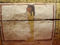 An "edited" version of an Osirus figure from the painted coffin of the 18th dynasty. The erect phallus was likely chipped away sometime in the late 19th century.