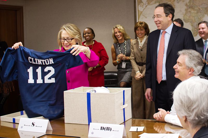 File:Hillary Clinton receives a football jersey.jpg