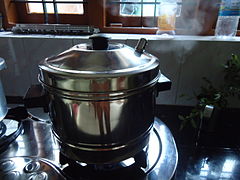 Steam the idli until the steam comes out from cooker