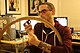 Josh Sawyer removing spokes from a bicycle wheel.jpg