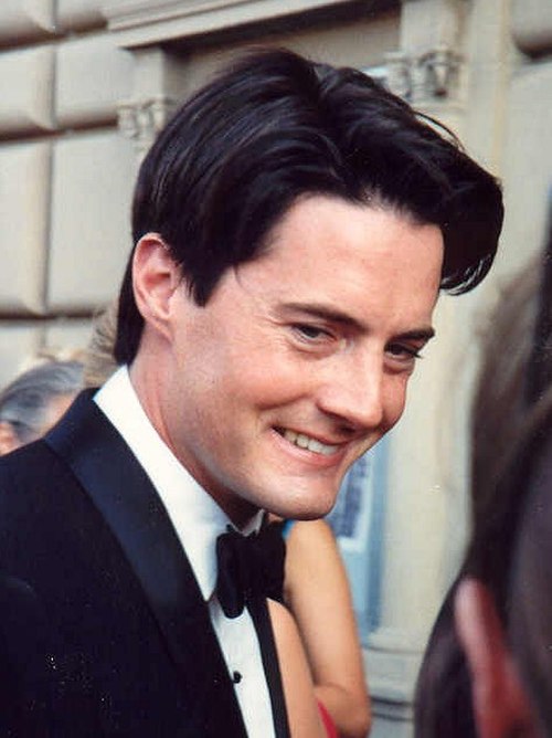 After solving the murder of Laura Palmer, Kyle MacLachlan's (pictured here in 1991) character of Dale Cooper stays in Twin Peaks to investigate furthe