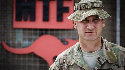 Iama aŭtoritata oficiro 8/9 RAR LTCOL K.S. Fegan.