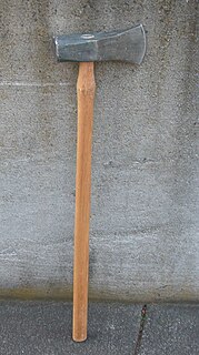 Splitting maul heavy, long-handled axe used for splitting a piece of wood along its grain