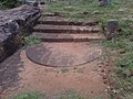 Moonstone and steps at Pavurallakonda Buddhist Ruins