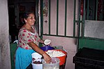 Thumbnail for File:Mujer preparando la pupusa.jpg