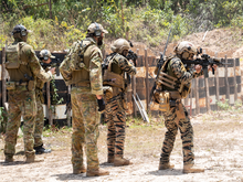 NAVSOCOM Operators (Aiming) with counterparts from Australian Special Forces during Balikatan 2019 NAVSOCOM Operators and US Special Forces Operators.png