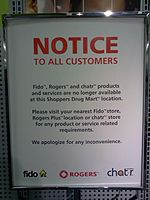A sign of Rogers, Fido and Chatr at Shoppers Drug Mart. NoMoRo.jpg