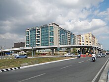 Sales Road section with the elevated Phase 1 of NAIA Expressway near Villamor Air Base (pictured in 2014), prior to the construction of the Phase 2 of NAIA Expressway PAFMuseumInteriorjf0606 18.JPG