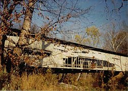 Extensive missing siding prior to the 1996 renovation