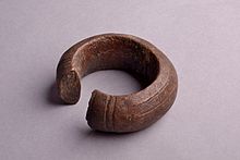 A variant form of manilla, decorated with a geometric design, in the collection of the Sforza Castle in Milan, Italy Raccolte Extraeuropee - AFR 00585 - Bracciale moneta (Manilla) (2).jpg