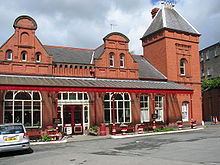 The Tickethall which occupies the former booking hall and station masters' office viewed from the frontage; this area was home to Greens vegetarian restaurant between 1990 and 2009. Railway station, Douglas, Man.JPG