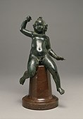 Figure of wingless Eros; 20–60 AD; cast bronze and silver inlay; 17.2 × 9.5 × 6.8 cm; Walters Art Museum