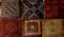 Modern cross-stitch cushions. From top left, clockwise: Gaza, Ramallah, Ramallah, Nablus, Beit Jalla, Bethlehem. Six cushions from Palestine.jpg
