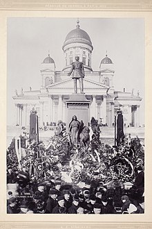 A sea of flowers at the statue of Alexander II on 13 March 1899 to remember the date of the death of the emperor. Slsa1237 2.jpg