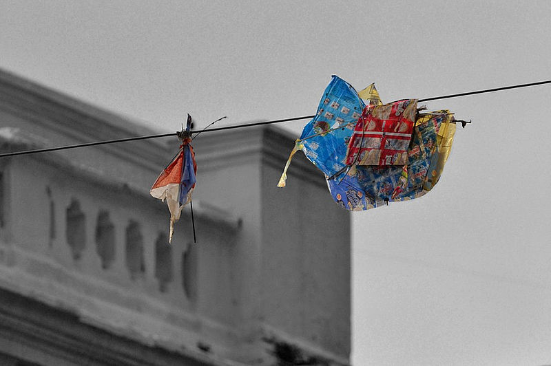 File:Some kid's kite strangled with wire - Flickr - askmeaks.jpg