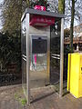 Pay telephone with internet access in Münster, Germany. March 2014, still using the old booth format but without a door.