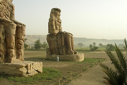 The Colossi of Memnon at the site of the mortuary temple of Amenhotep III