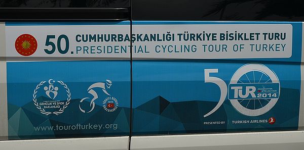 Logo of the 50th Presidential Cycling Tour of Turkey on an official car.