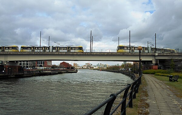 Two trams crossing the Manchester Ship Canal on Pomona Viaduct.