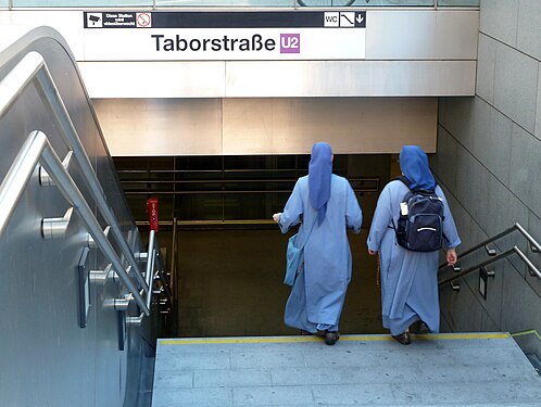 Two nuns entering Underground station Taborstraße in Vienna