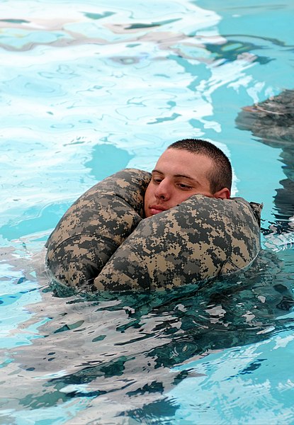 File:U.S. Army Spc. Alex Muenz, an engineer from 336th Engineer Company, properly uses his Army Combat Uniform trousers as a flotation device during drown proof training on Fort Hunter Liggett, Calif., Aug. 6, 2011 110806-A-AJ827-814.jpg