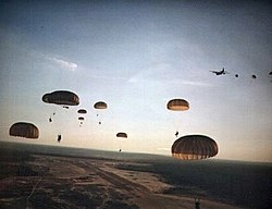 US Army Rangers parachute into Grenada during Operation Urgent Fury.jpg