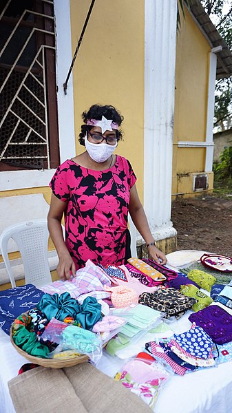 File:Vendor at a village market in Goa, 2021.jpg