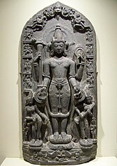 11th-century Vishnu sculpture the goddesses Lakshmi and Sarasvati. The edges show reliefs of Vishnu avatars Varaha, Narasimha, Balarama, Rama, and others. Also shown is Brahma. (Brooklyn Museum)[181]