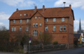 English: Building (former school) in Wartenberg, Angersbach, Schulstrasse 5, Hesse, Germany.