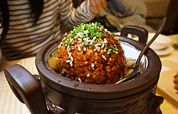 Lion's Head is a dish from the Huaiyang cuisine of eastern China, consisting of large pork meatballs stewed with vegetables. Shi Zi Lou Shi Zi Tou .jpg