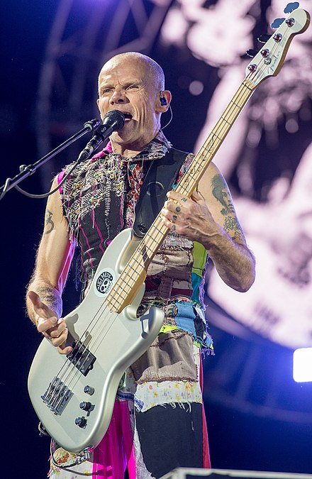 Flea performing with Red Hot Chili Peppers in 2016