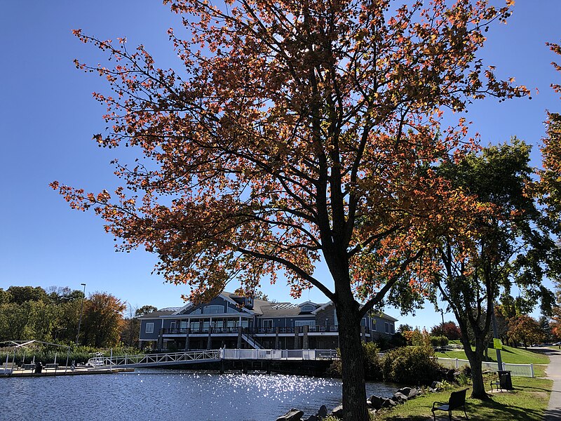 File:2023-10-23 11 46 12 The northwest side of the Boathouse at Mercer Lake viewed from the Gazebo peninsula within Mercer County Park in West Windsor Township, Mercer County, New Jersey.jpg