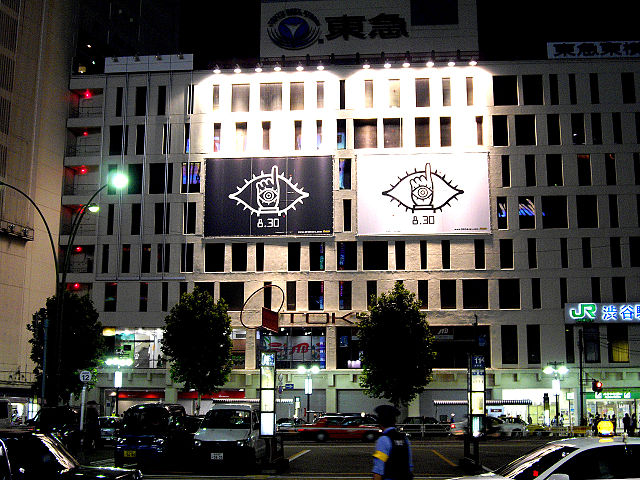 Billboards in Shibuya advertising the first film, featuring the symbol of the character Friend.